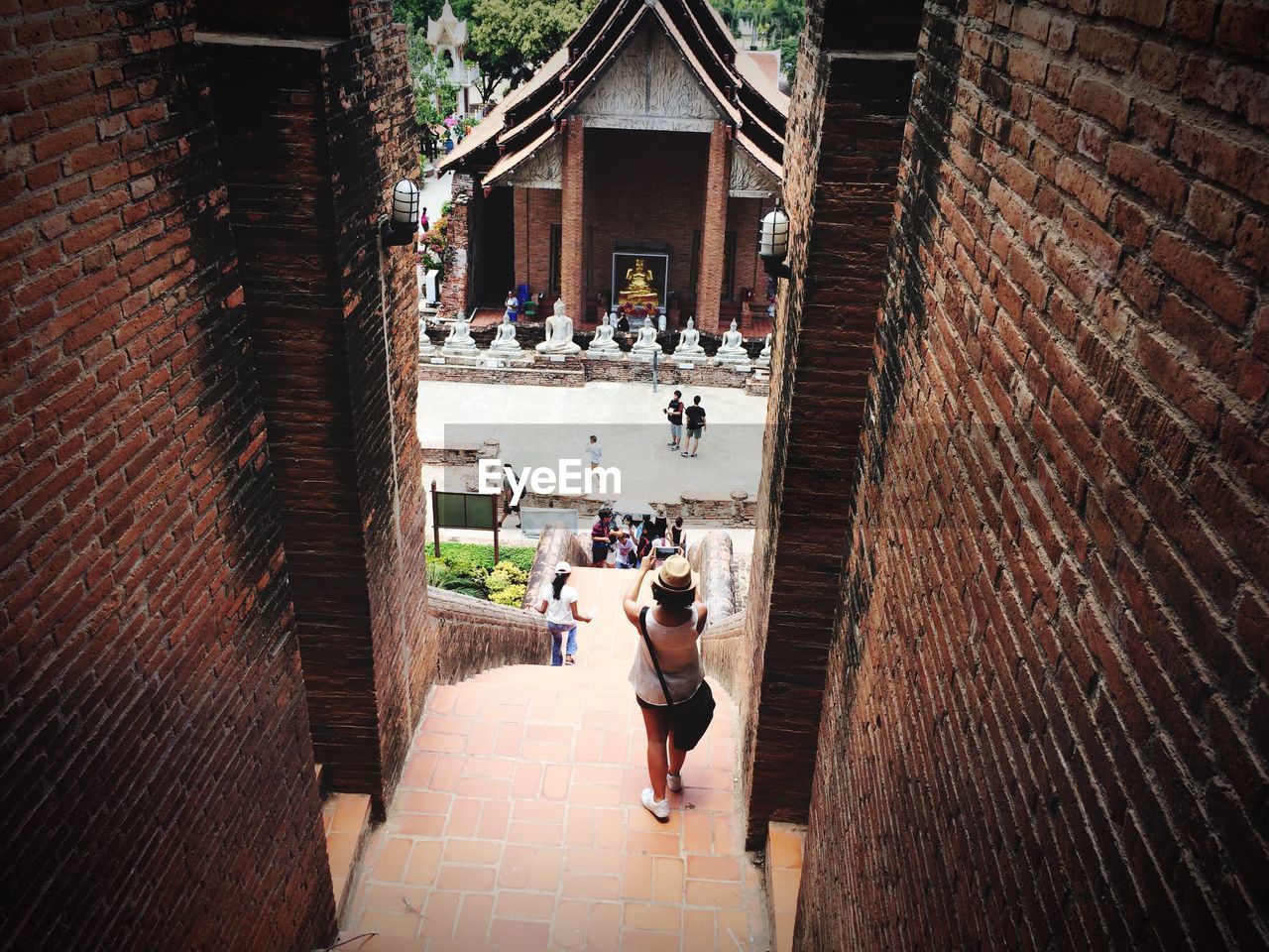 PEOPLE WALKING ON STEPS