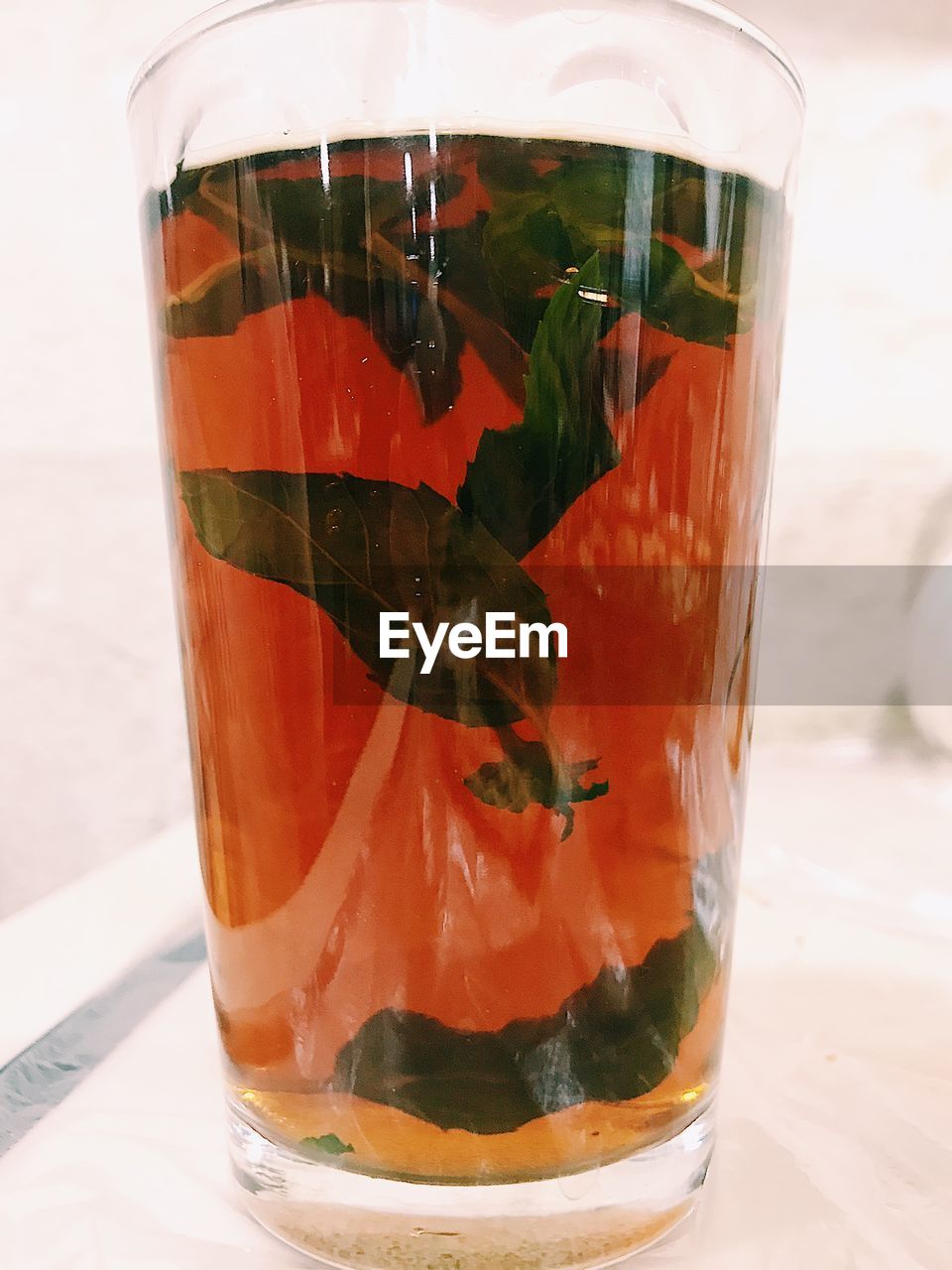 Close-up of mint tea on table