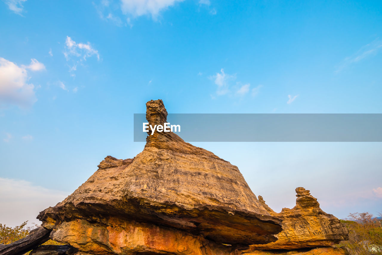 LOW ANGLE VIEW OF ROCKS AGAINST SKY