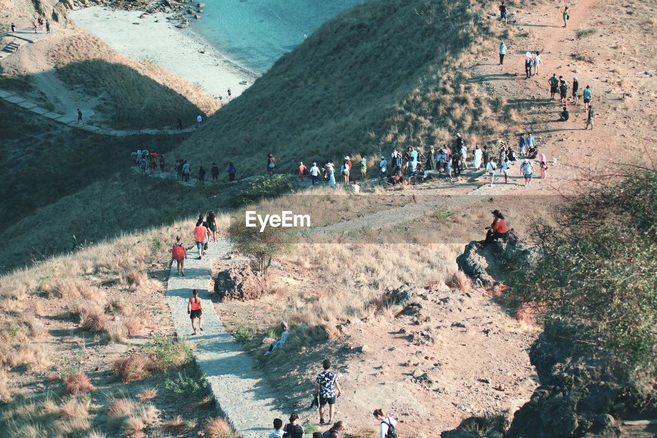 High angle view of people on mountain road