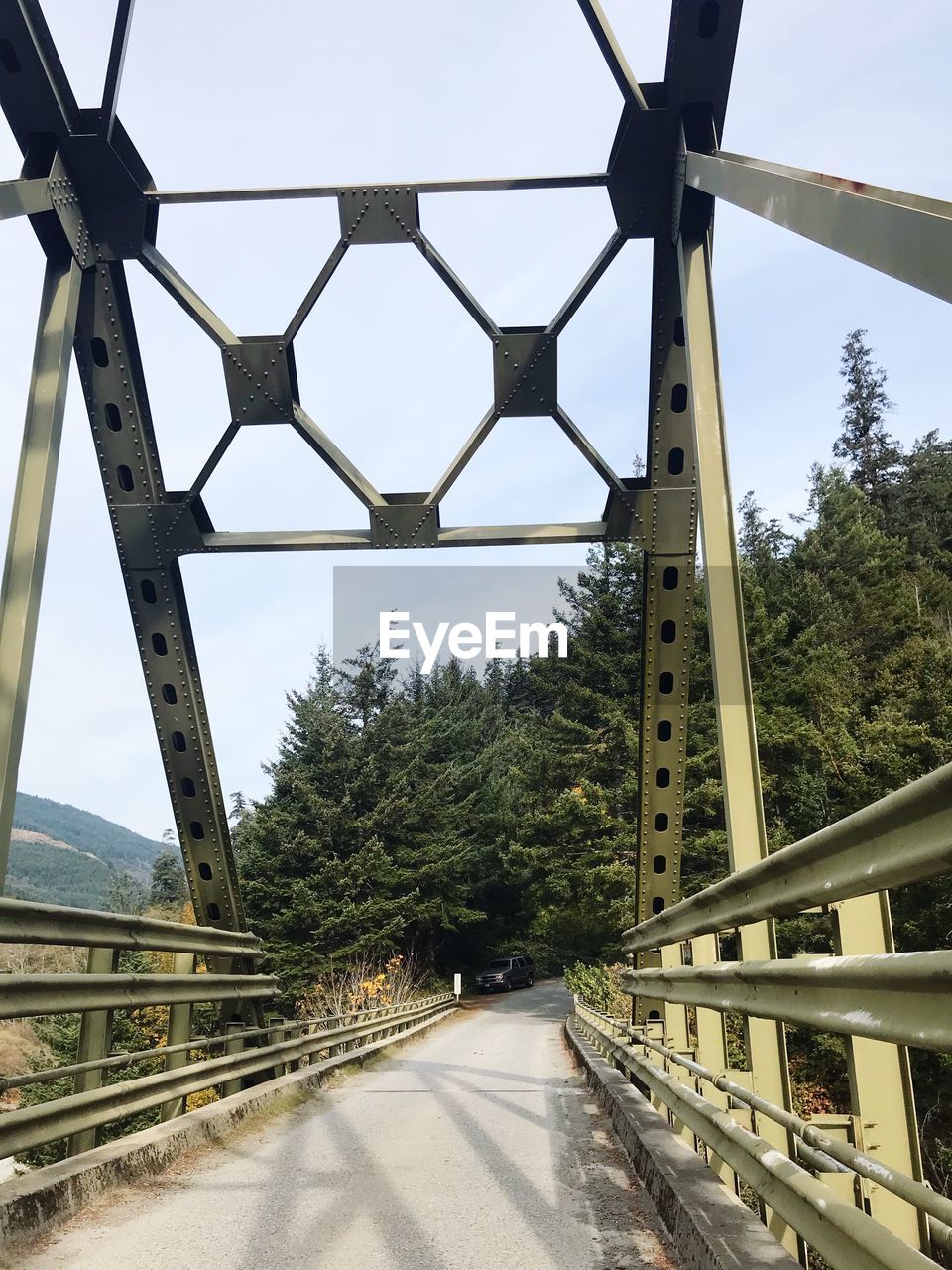 ROAD BY BRIDGE AGAINST SKY