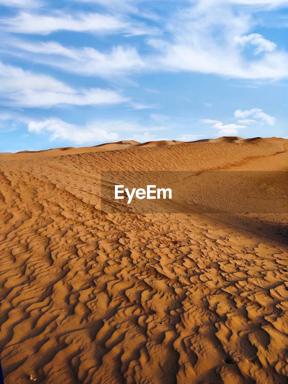 Scenic view of desert against sky