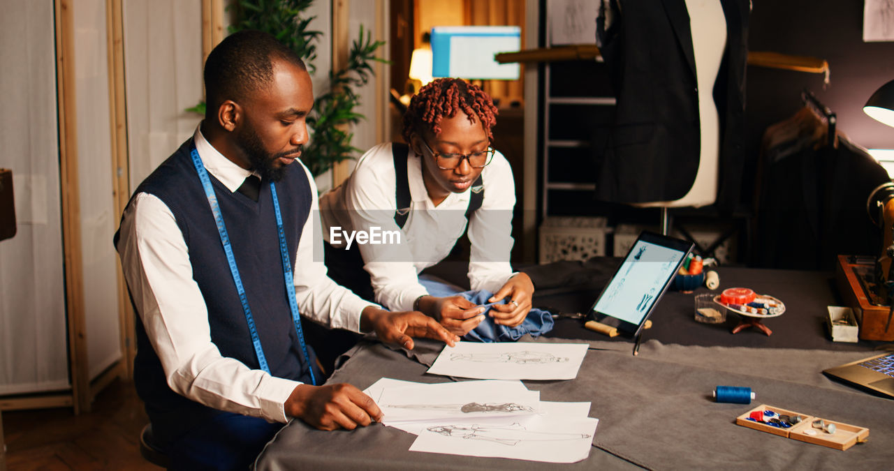 business colleagues working at desk in office