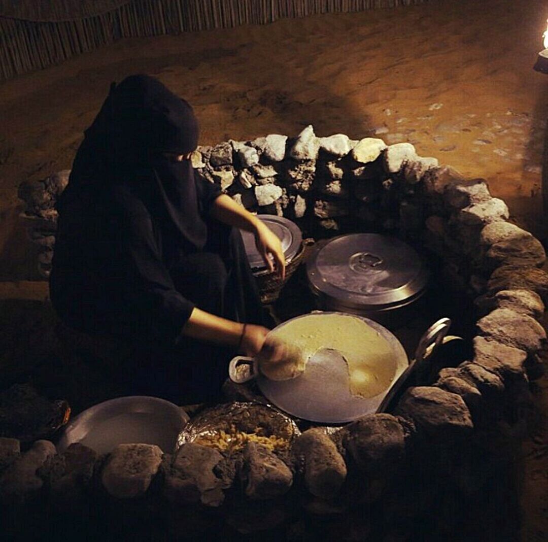 High angle view of woman cooking