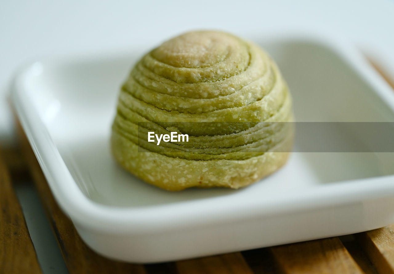 food and drink, food, dish, produce, dessert, freshness, sweet food, citrus, sweet, no people, indoors, close-up, cuisine, plate, baked, table, breakfast, wood, healthy eating, focus on foreground, fast food, fruit, still life