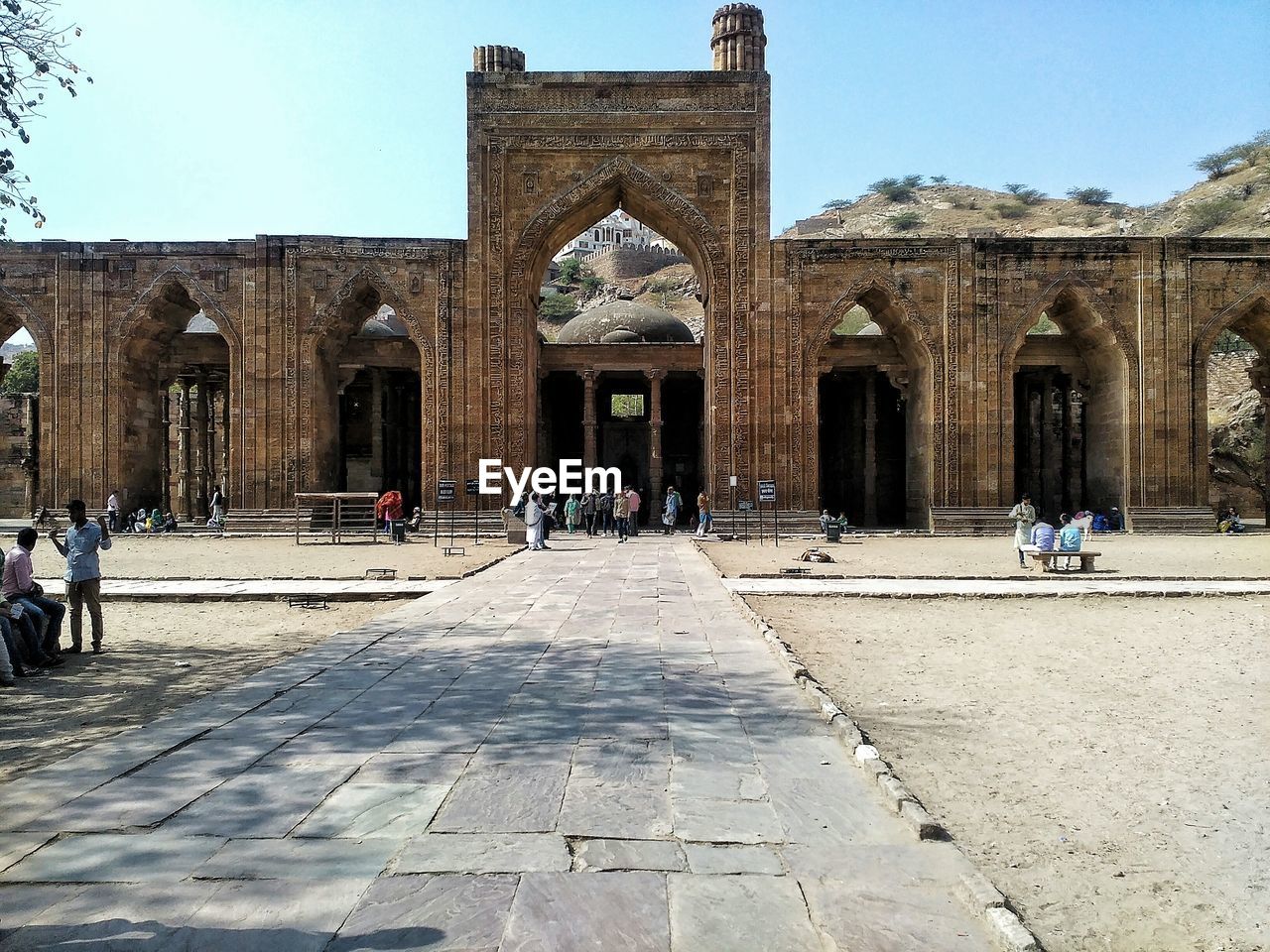 People in front of historical building