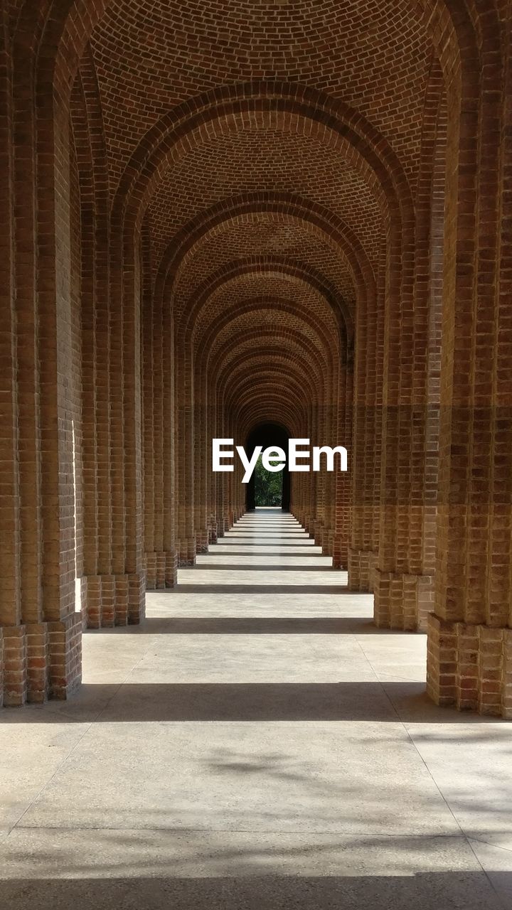 CORRIDOR OF BUILDING WITH COLONNADE