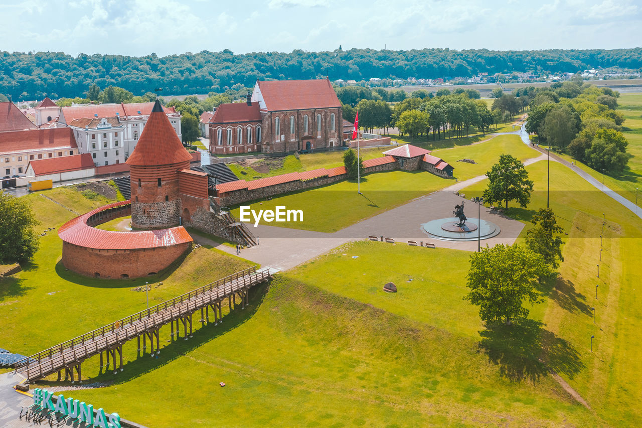 HIGH ANGLE VIEW OF TREES AND BUILDINGS