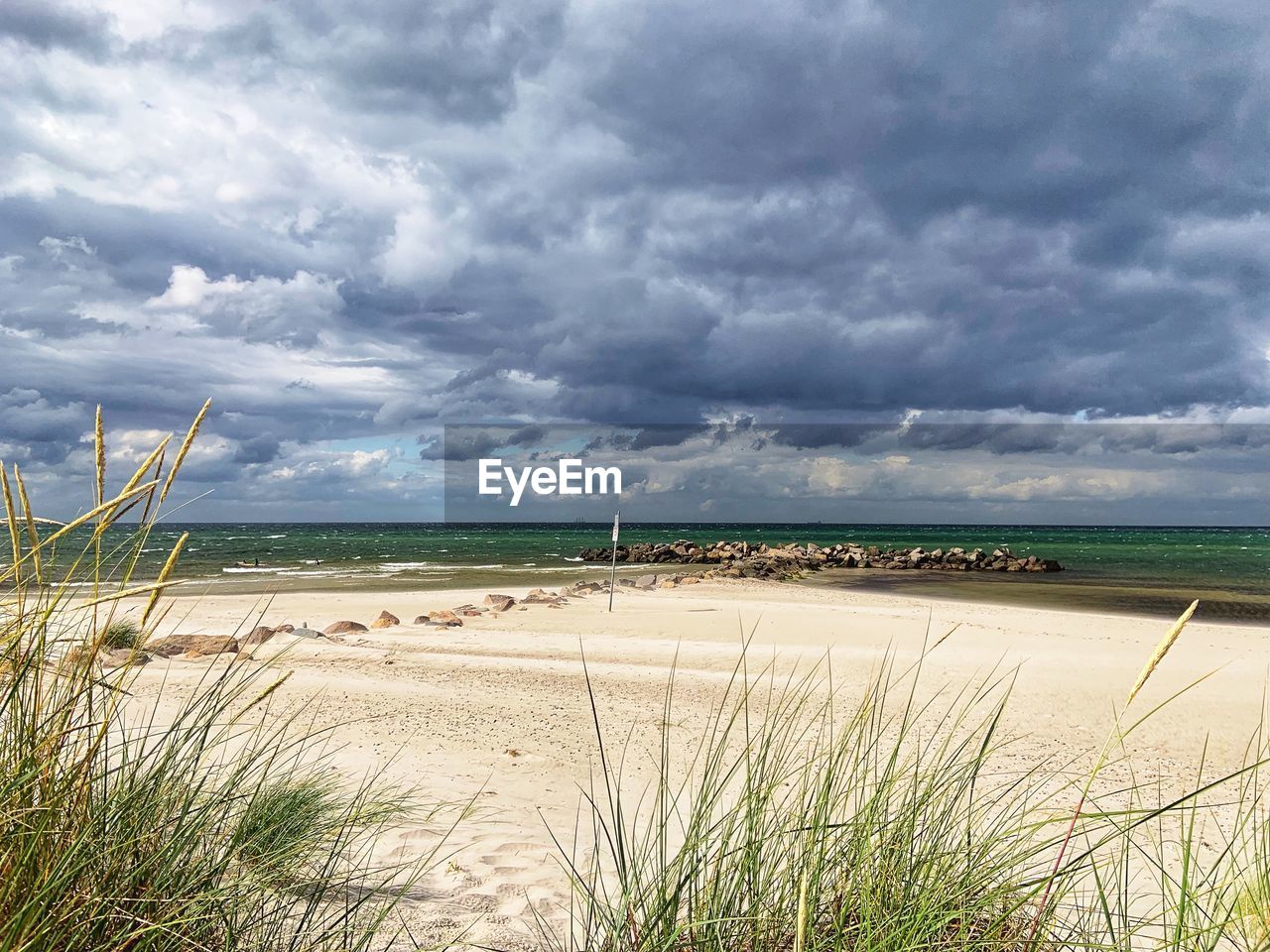 Scenic view of beach against sky