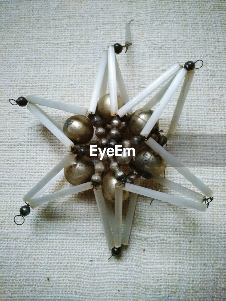 Close-up of star shape christmas decoration hanging