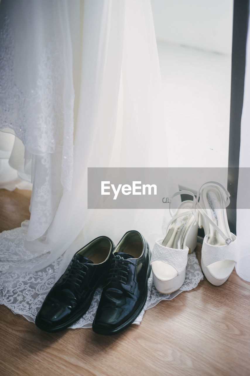 High angle view of footwear on hardwood floor