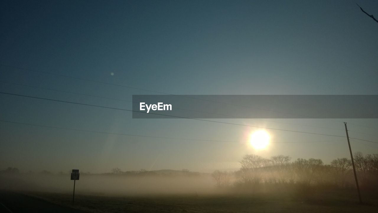 SCENIC VIEW OF LANDSCAPE AT SUNSET