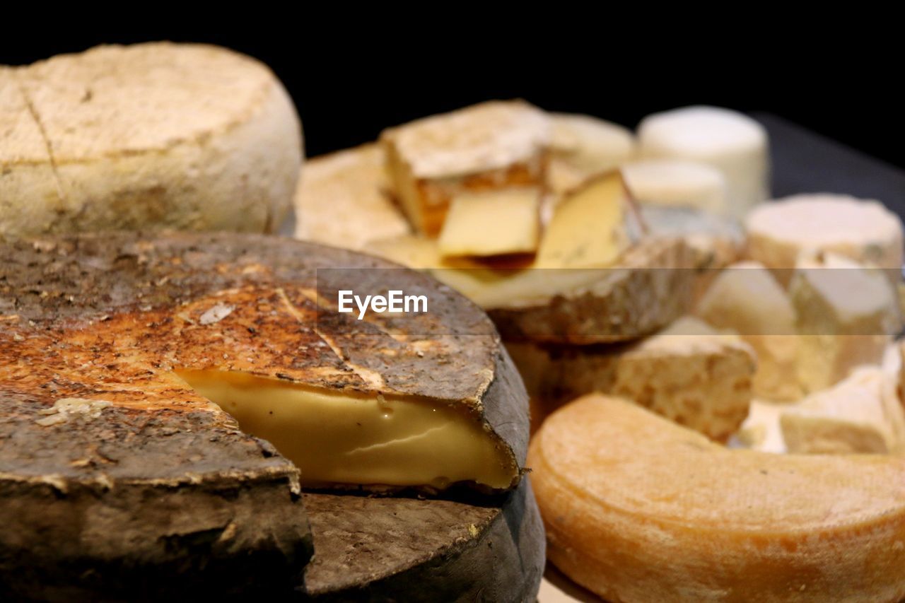 High angle view of various cheese in plate