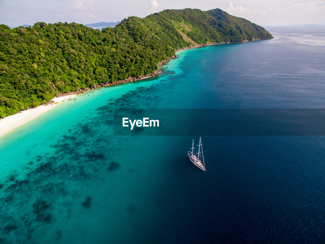 Sailboat at anchor in the remote mergui archipelago of myanmar.
