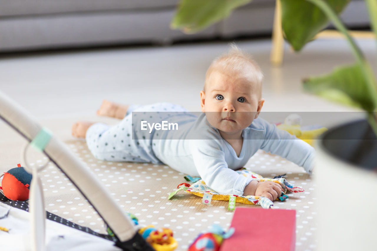 high angle view of boy playing with toys