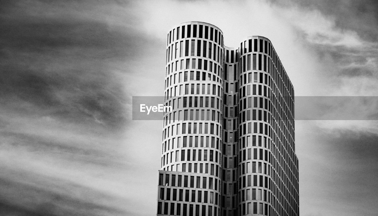 Low angle view of modern building against sky