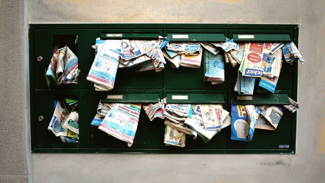 Waste paper in mailboxes