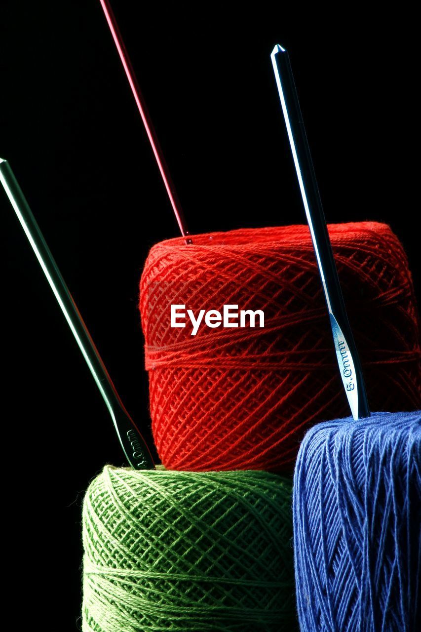 Close-up of multi colored spools