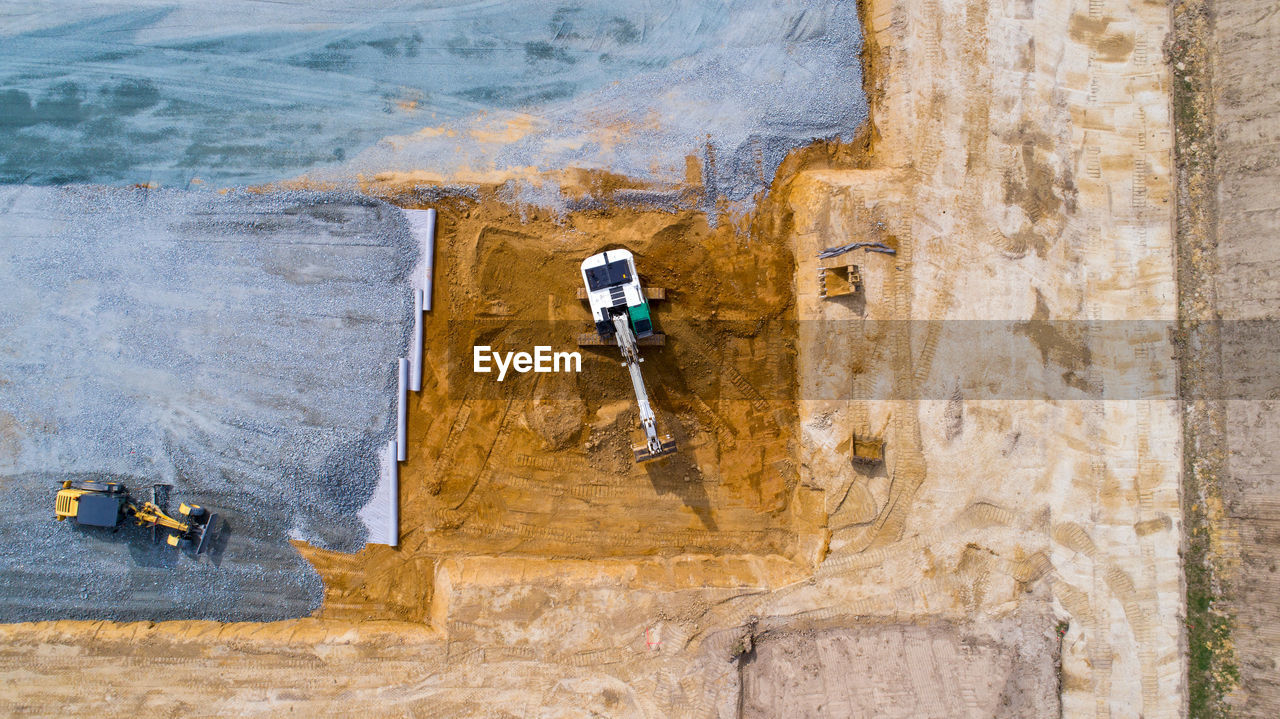 Directly above shot of construction vehicles at site