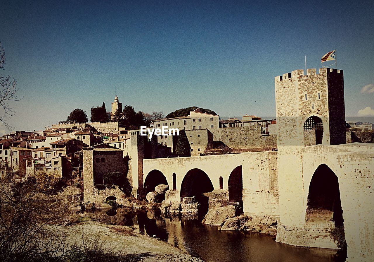 Old castle against sky at catalonia