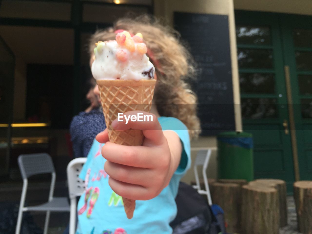 Close-up of hand holding ice cream