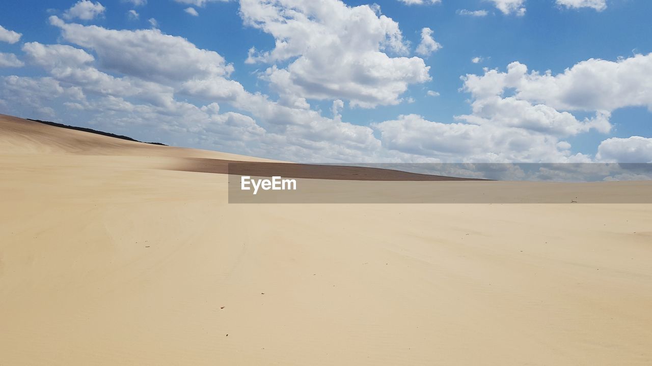 Scenic view of desert against sky