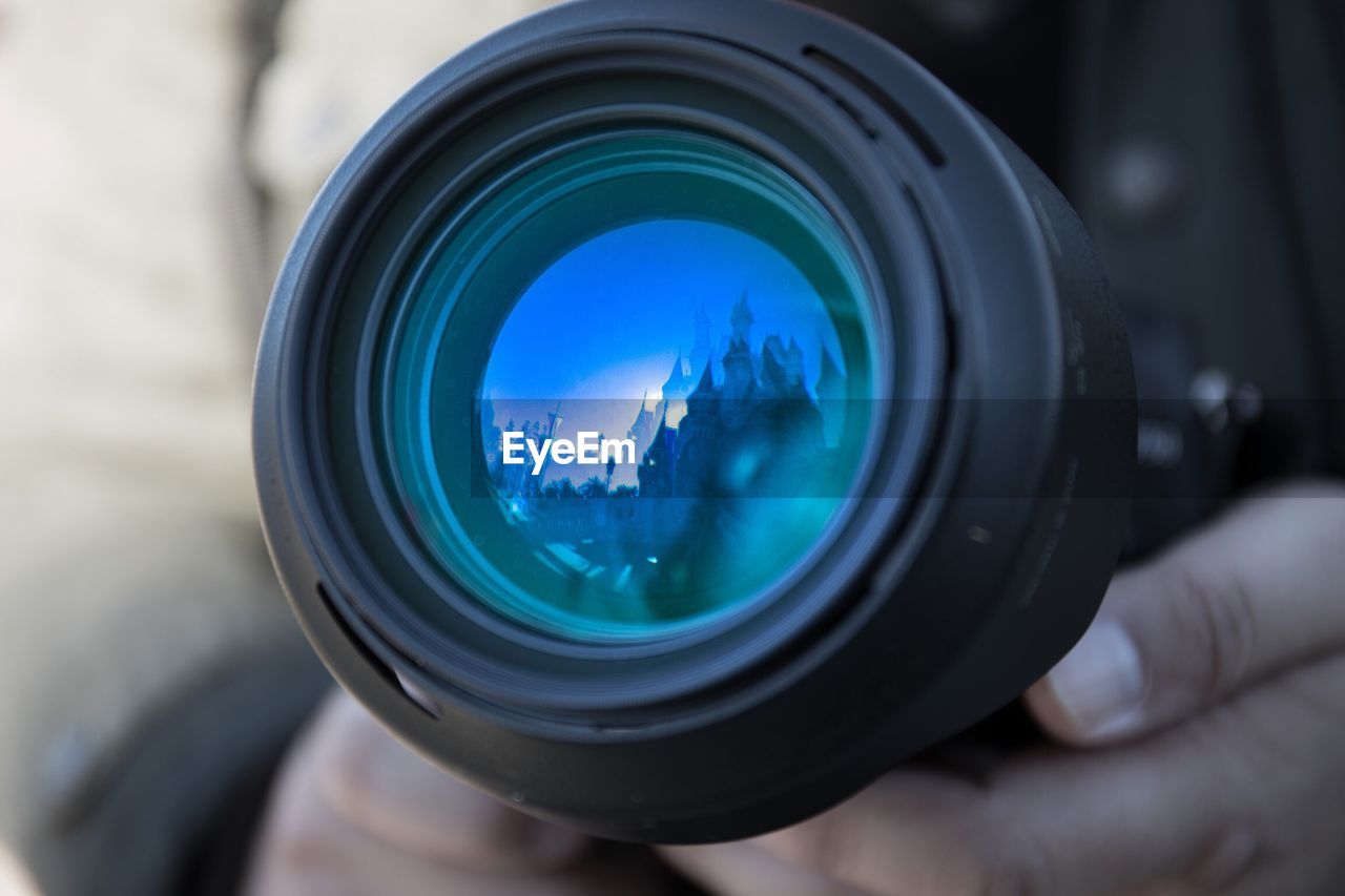 Close-up of hand holding camera