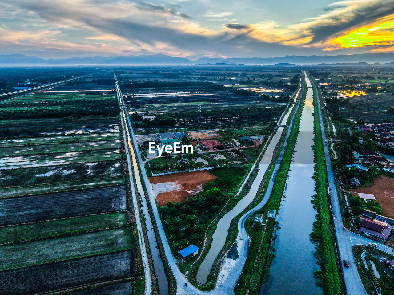 High angle view of water channel for paddy field