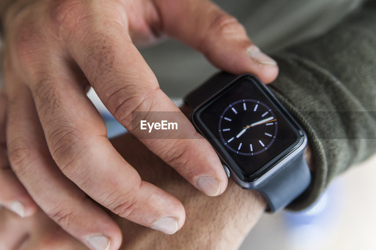 Businessman with smartwatch, close-up