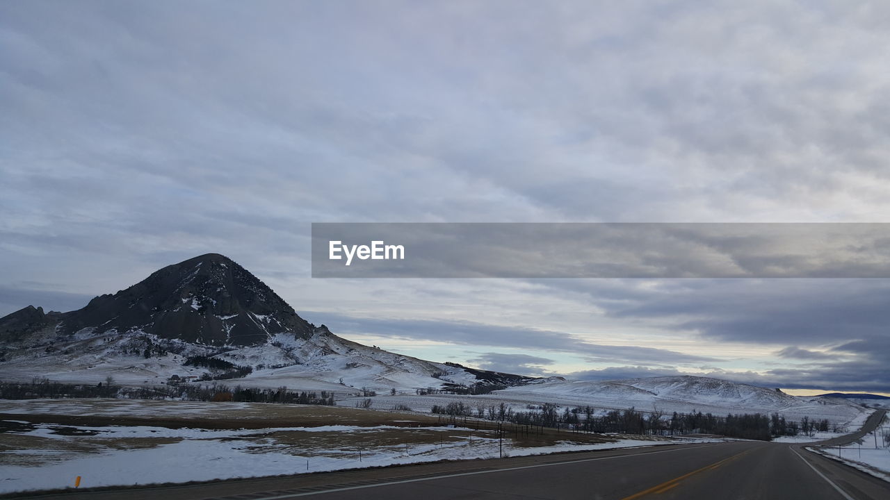 SCENIC VIEW OF MOUNTAINS AND SKY