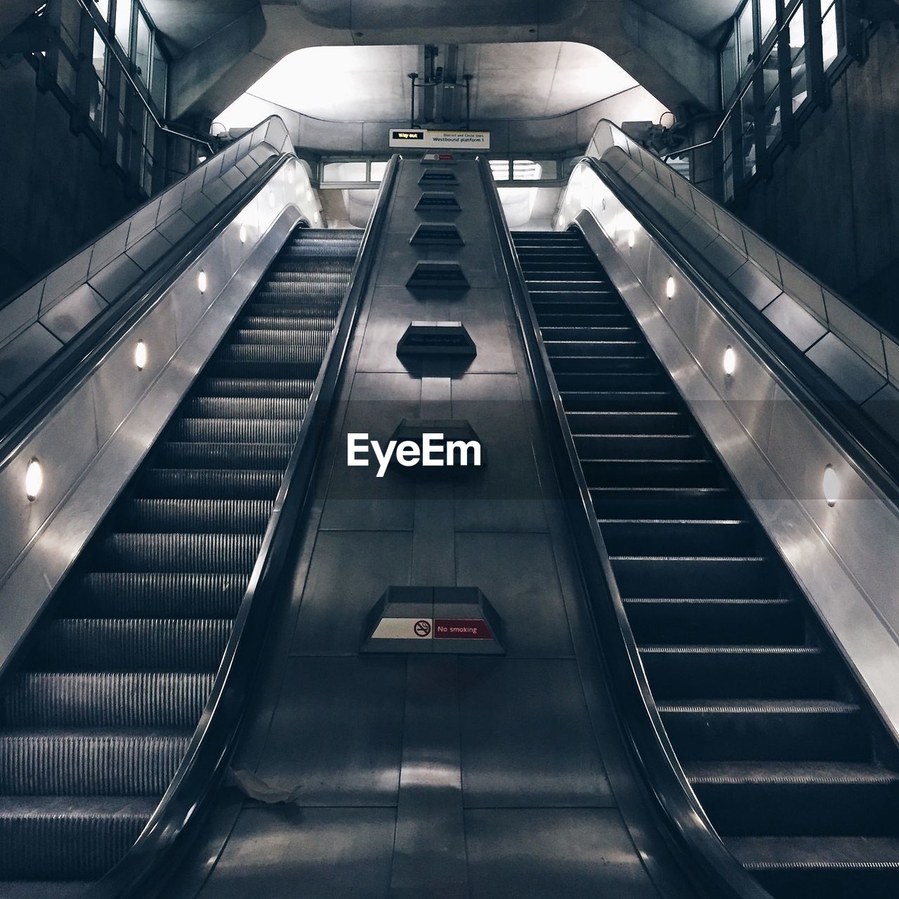 Low angle view of escalators at underground station