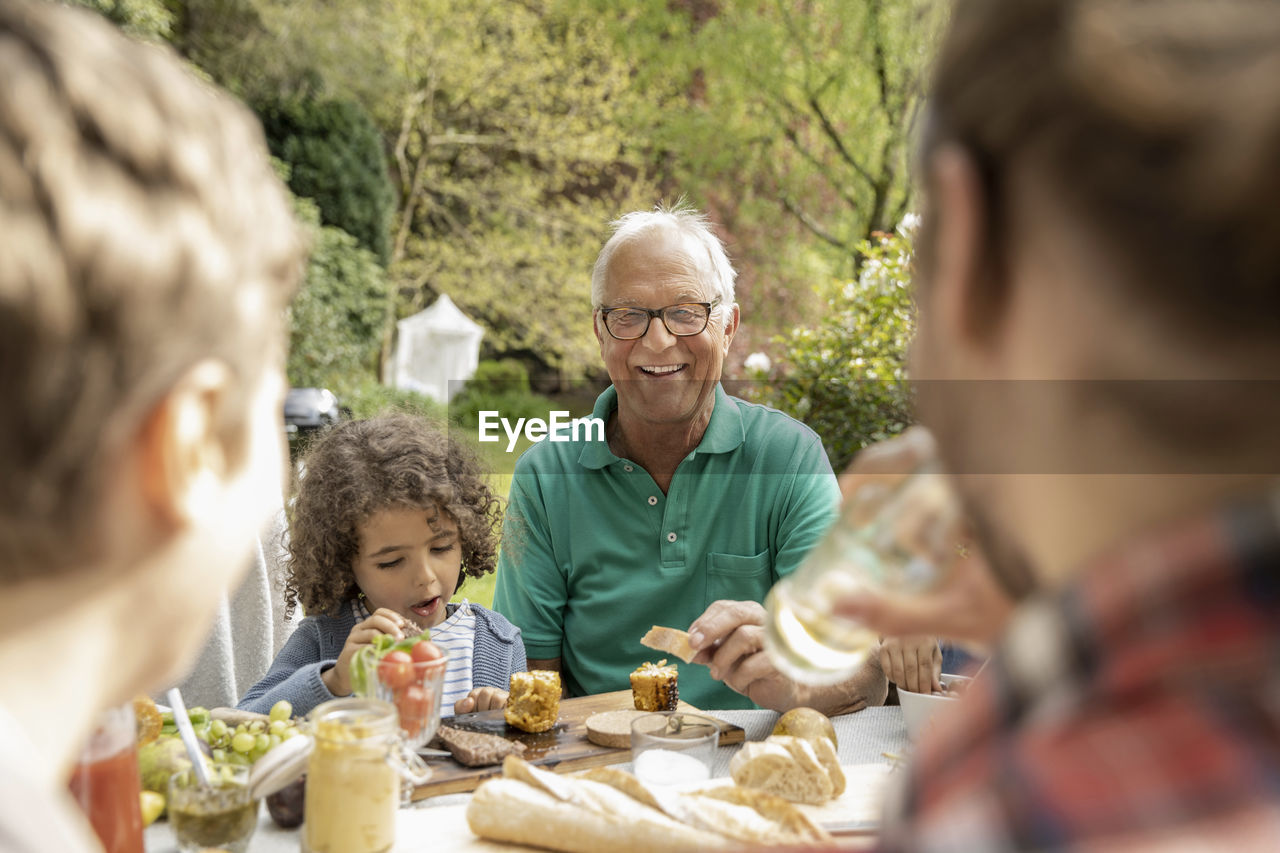 Extended family having lunch in garden