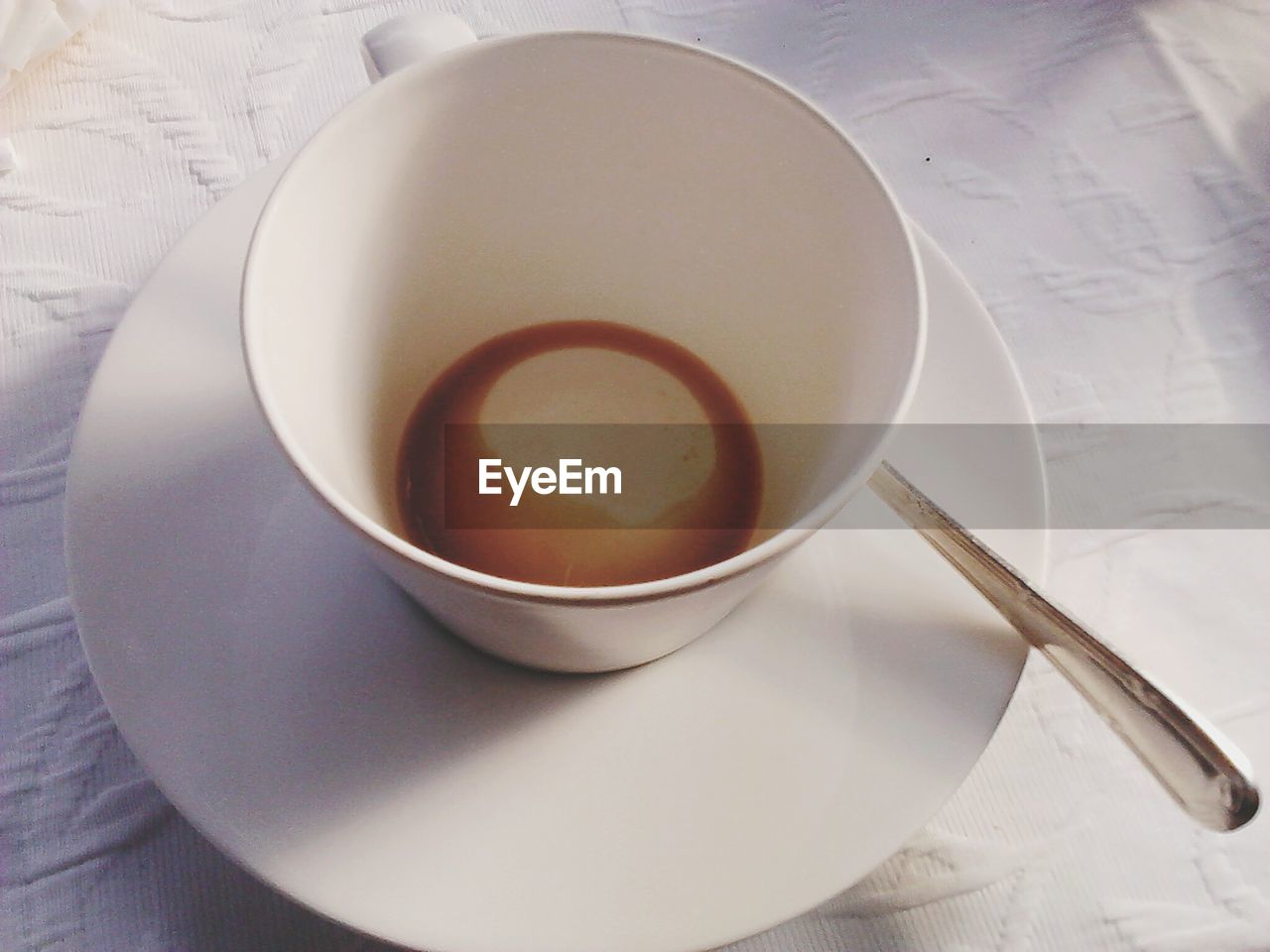 High angle view of empty coffee cup on table