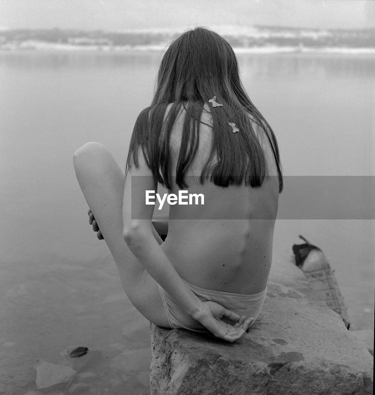 Rear view of woman looking at sea