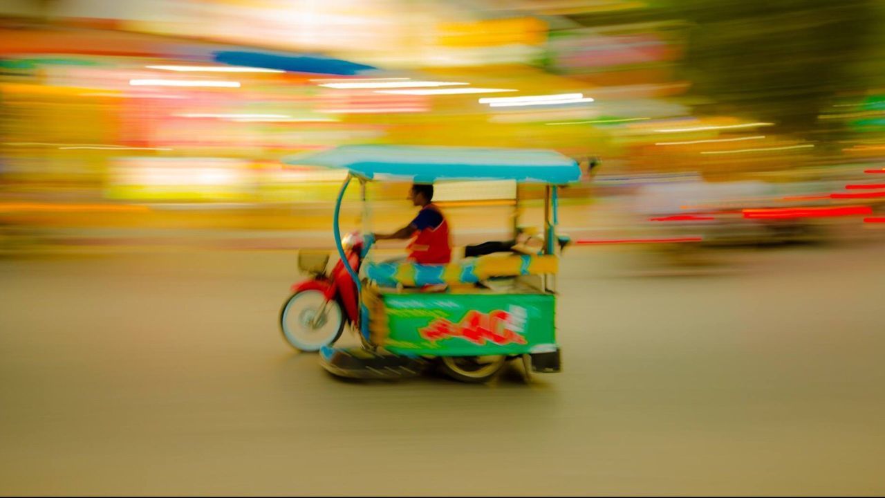 BLURRED MOTION OF WOMAN DANCING ON WALL