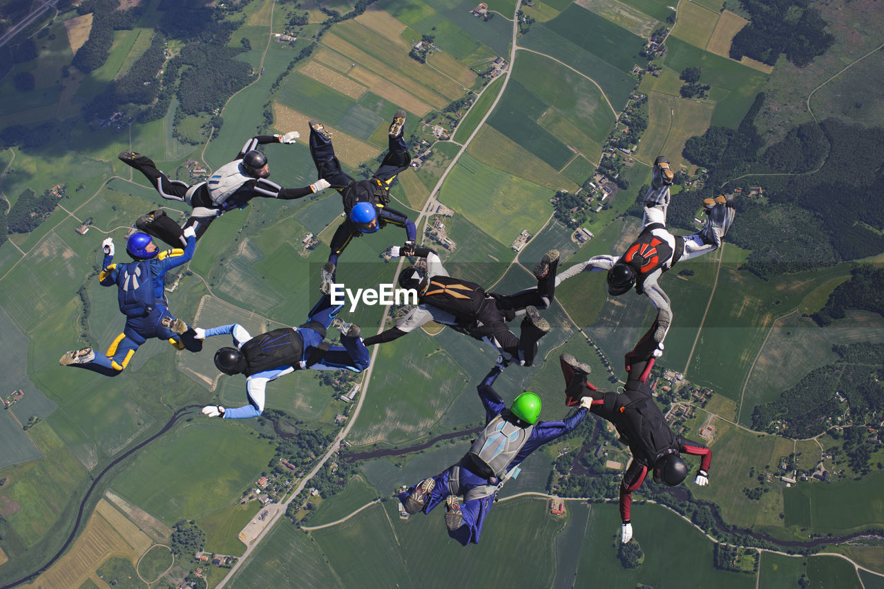 Skydivers in formation mid-air