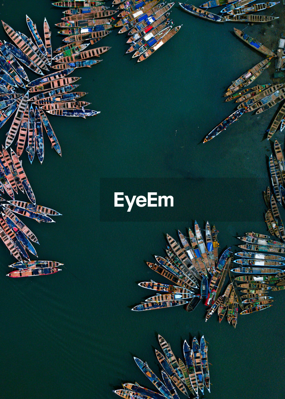 High angle view of canoes at a fishing harbor