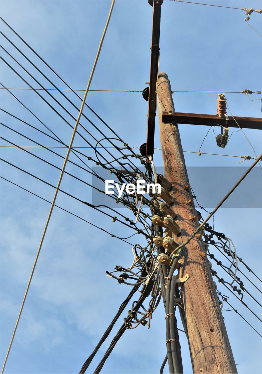 LOW ANGLE VIEW OF ELECTRICITY PYLON