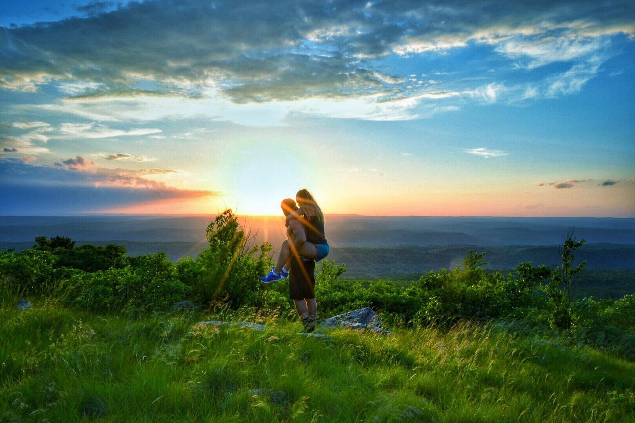 Scenic view of landscape at sunset