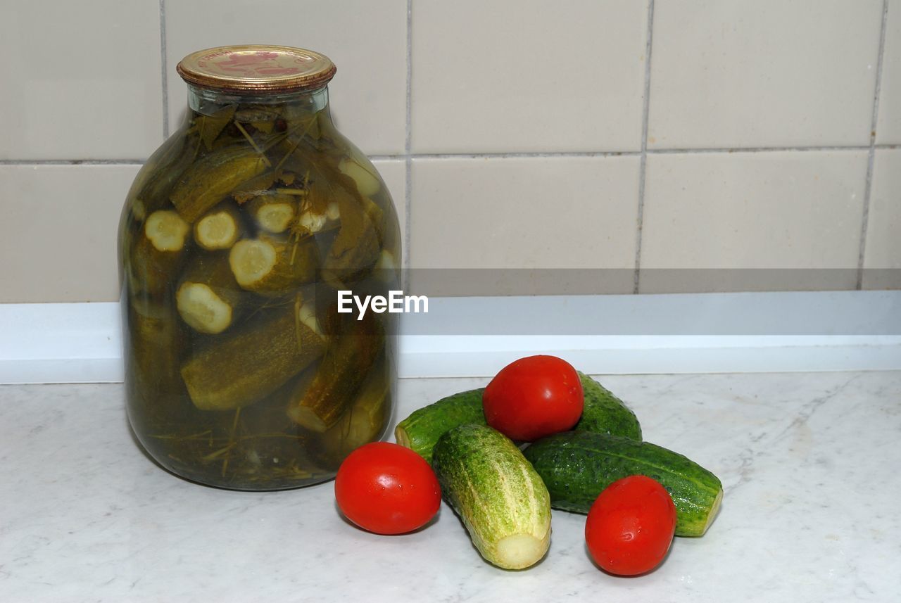 CLOSE-UP OF FRUITS ON TABLE