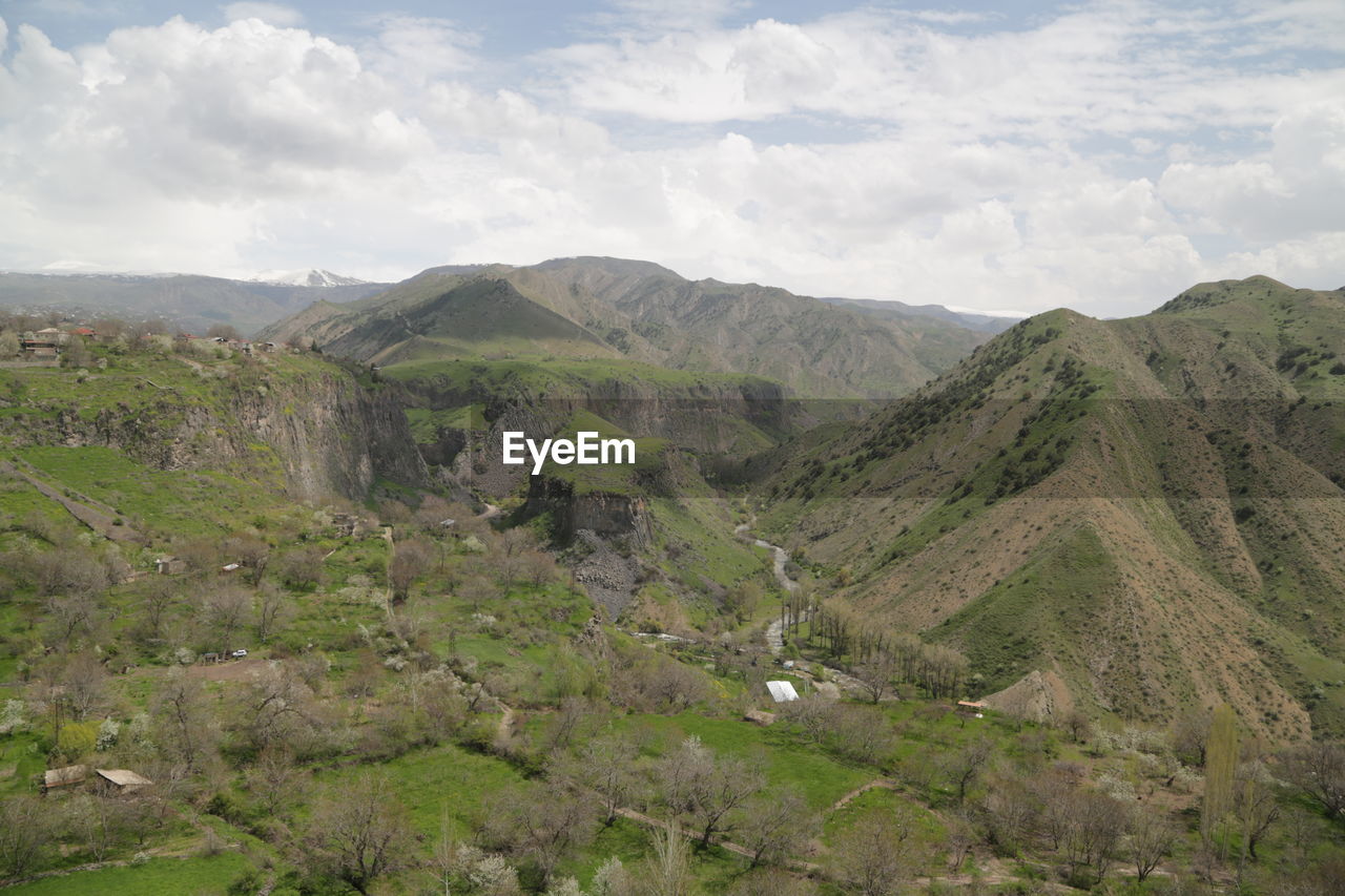 Scenic view of mountains against sky