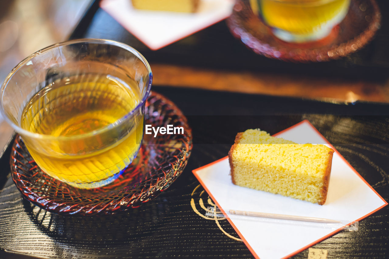 Nagasaki's famous sweets castella tray with sponge cake on it