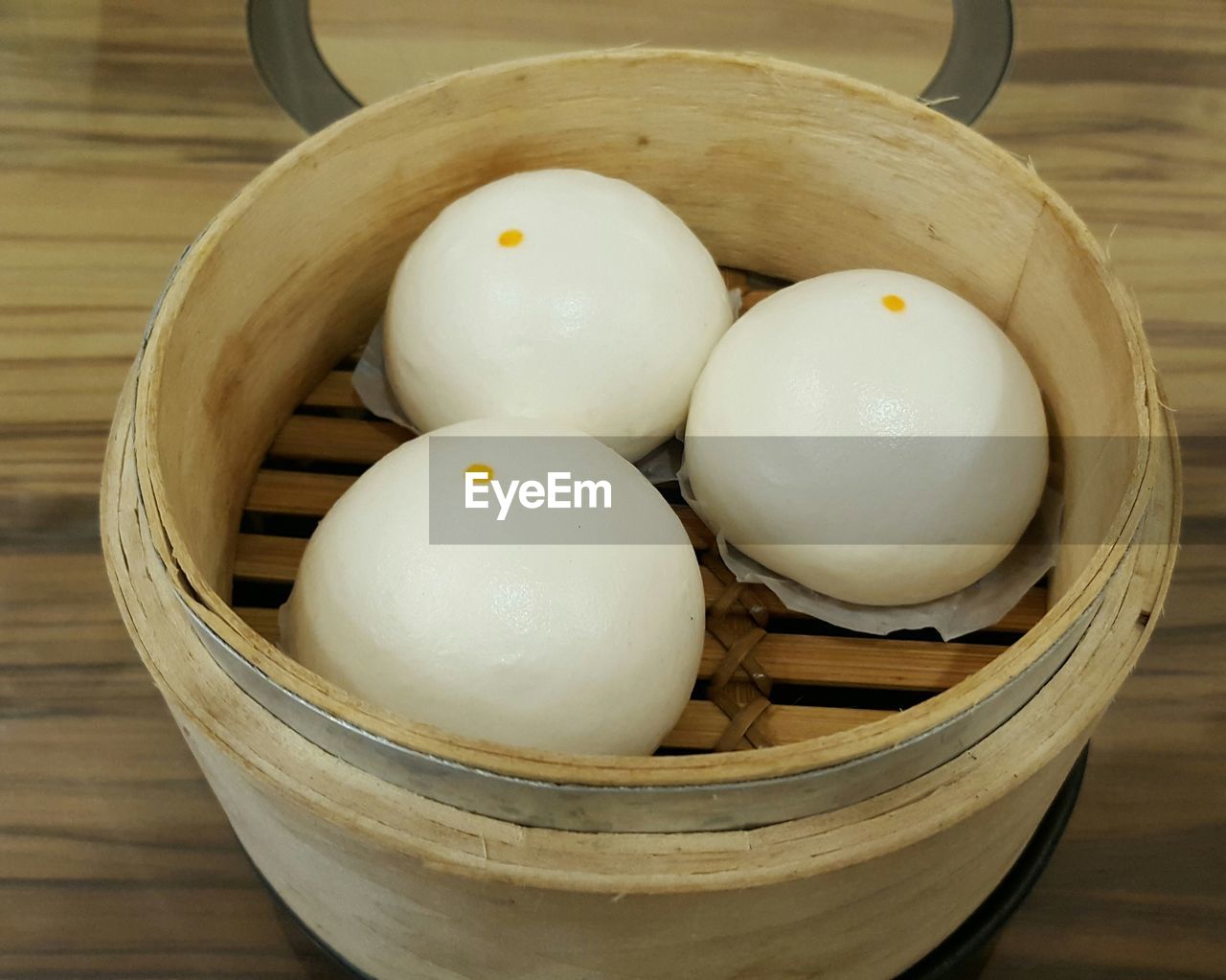 High angle view of dumplings in bamboo steamer