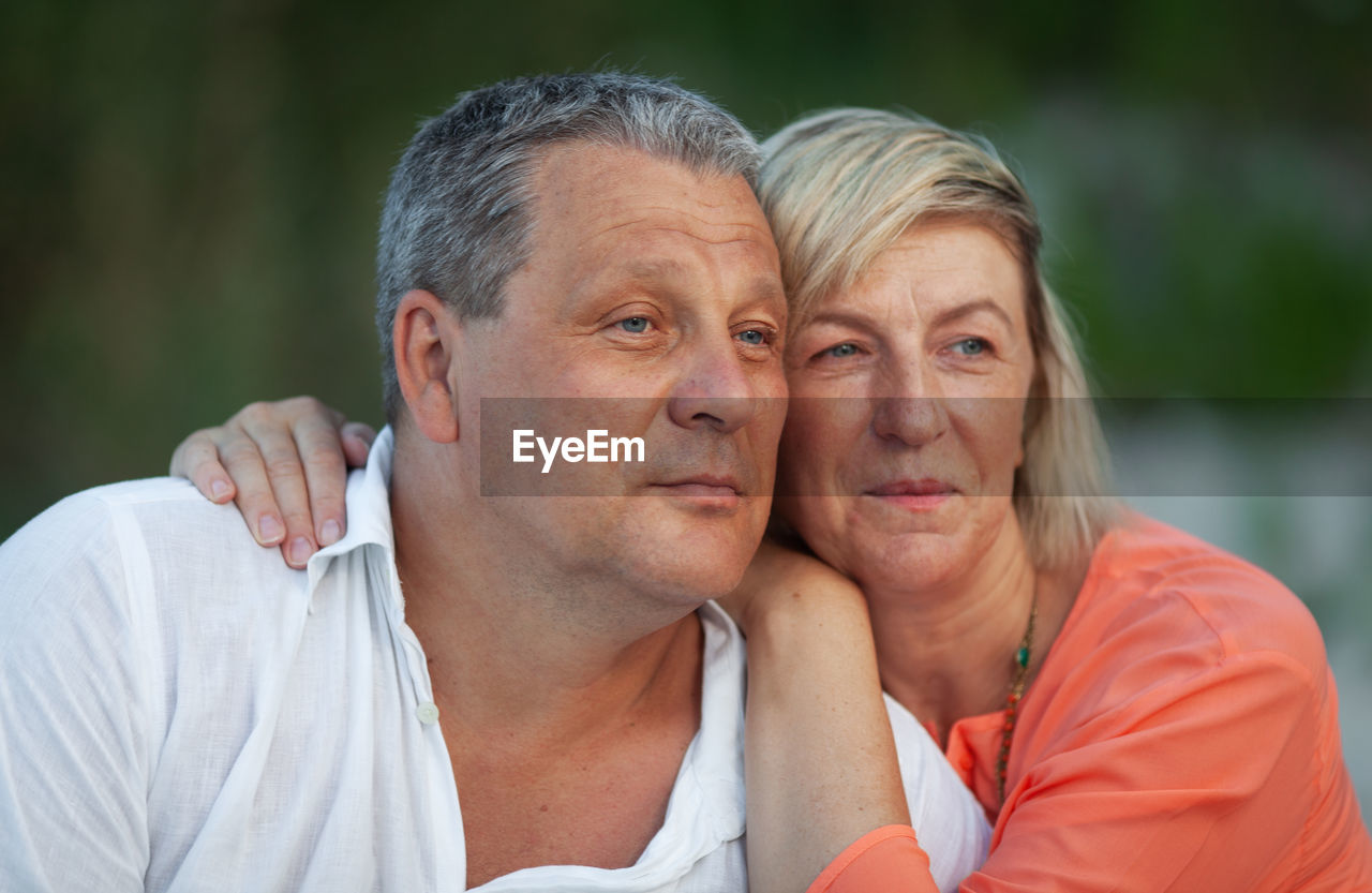 PORTRAIT OF A COUPLE WITH MOTHER