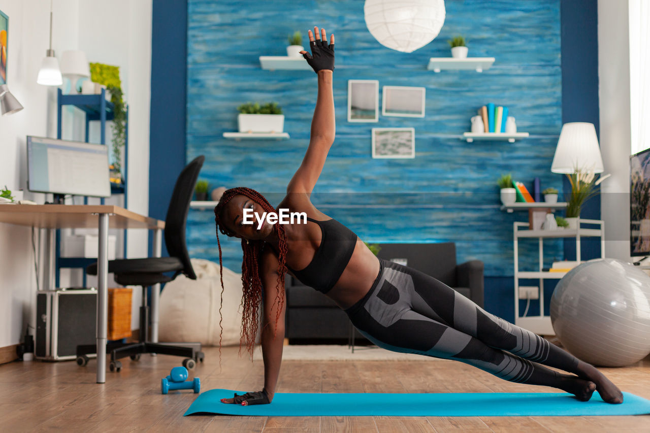 Woman exercising at home