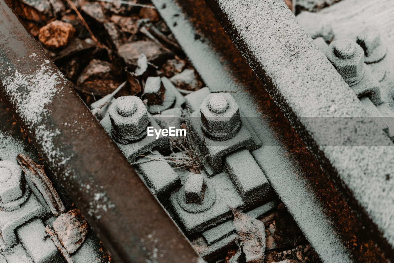 High angle view of rusty metal on snow