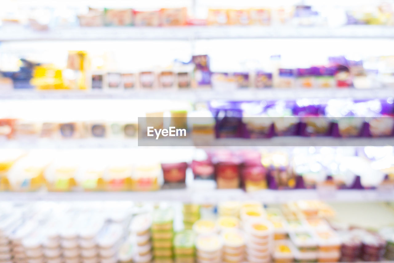 Defocused image of shelves in supermarket