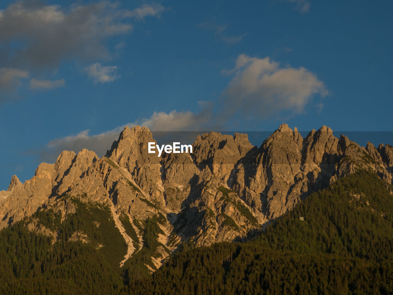 Scenic view of mountain range against sky