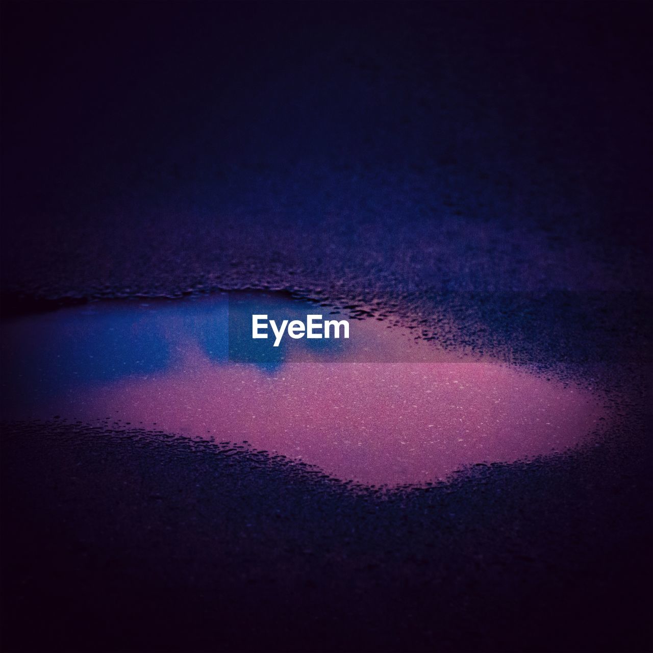 FULL FRAME SHOT OF BLUE SKY REFLECTING IN PUDDLE