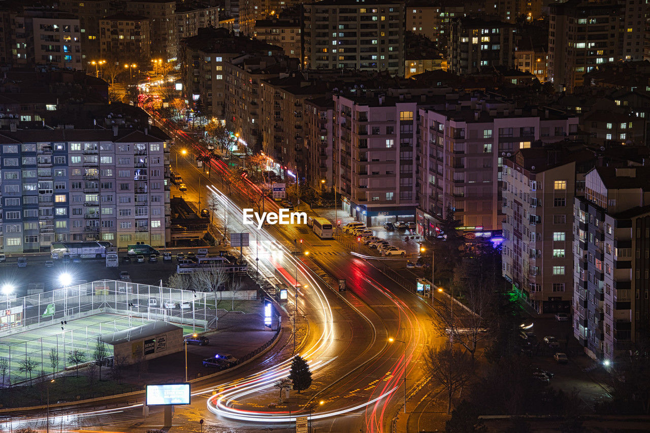 high angle view of illuminated city lit up at night